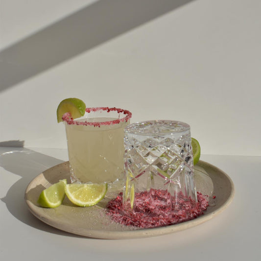 Cocktail glass rimmed with F N Lemons raspberry rim sugar