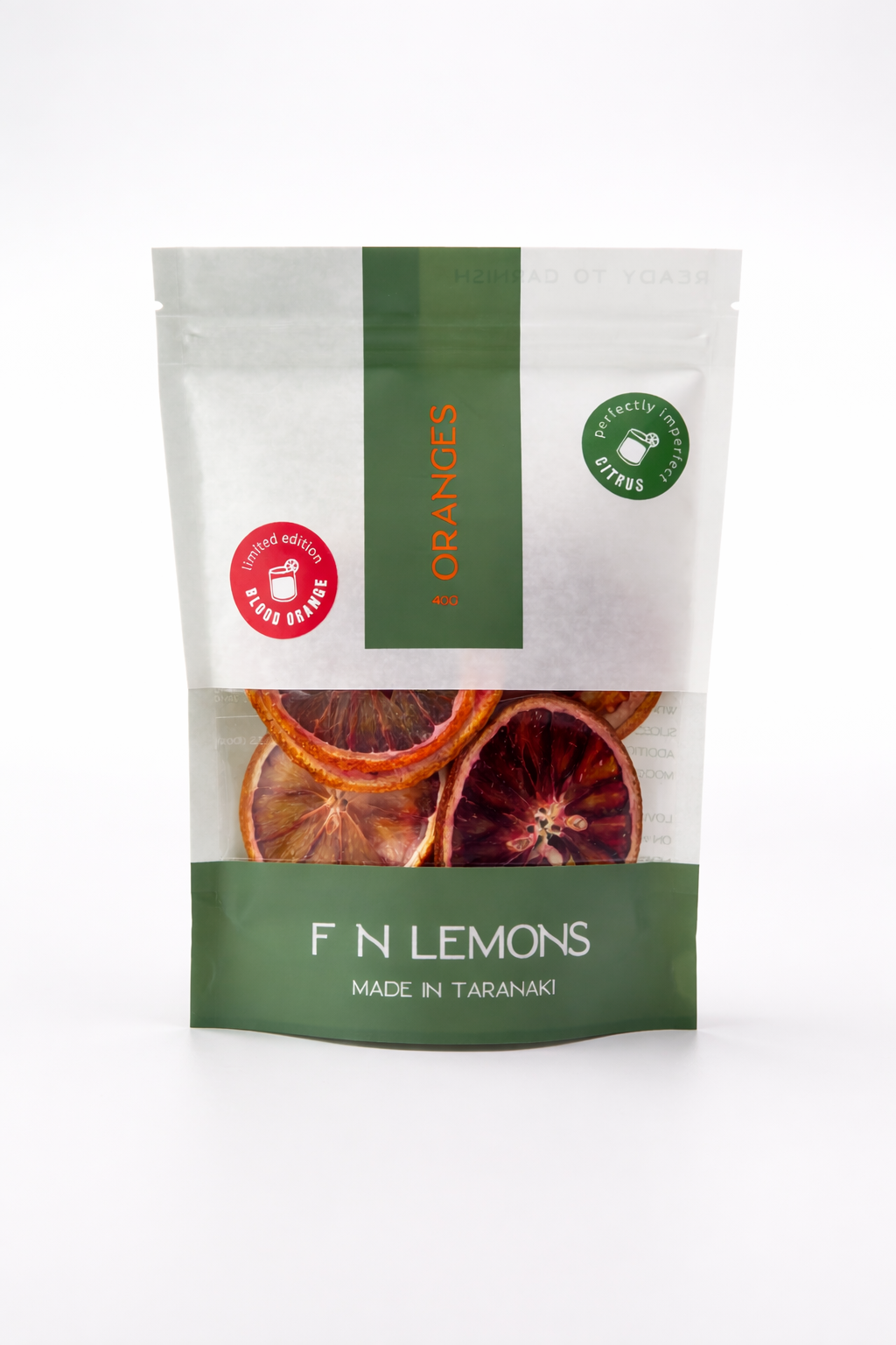 F N Lemons packaging with dried blood orange slices on a white background